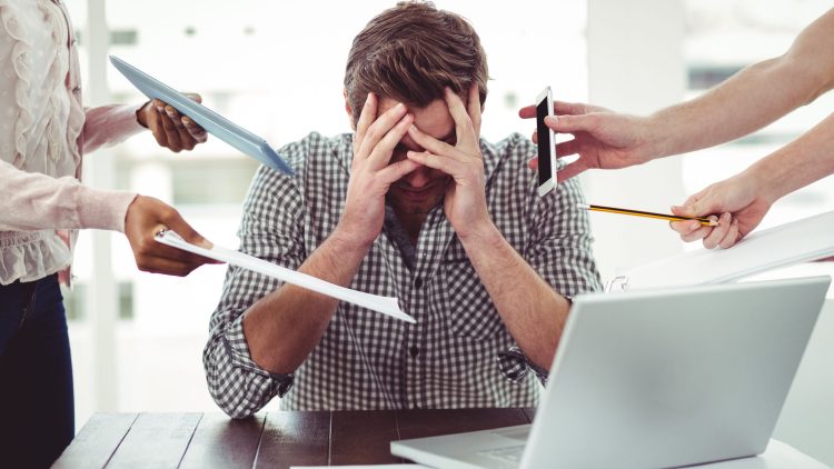 47404442 – businessman stressed out at work in casual office
