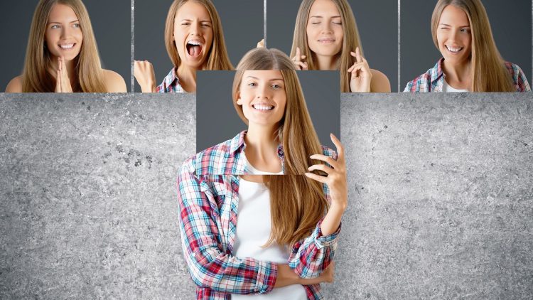 Young,European,Businesswoman,Hiding,Herself,Behind,Poster,With,Smiling,Face.